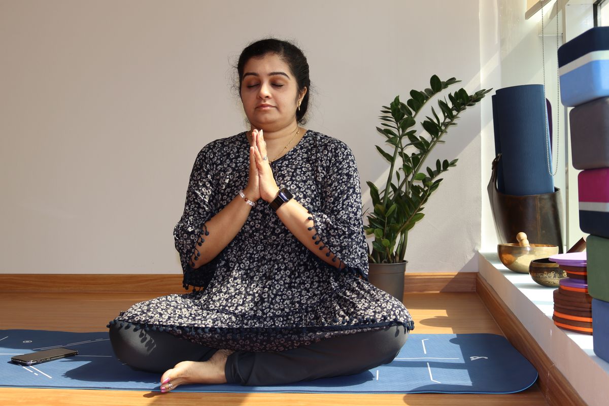 Student meditating in the Thousand Petaled Lotus studio