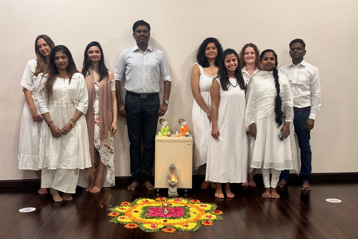 Yoga teacher training graduates with Dr. Kasi in Dubai
